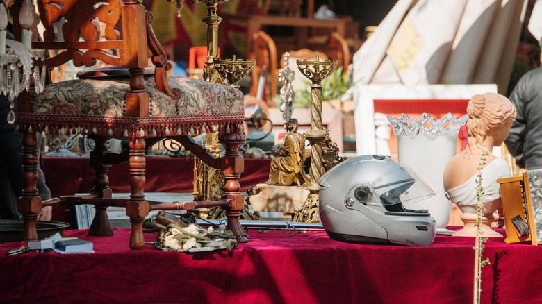 Motorcycle helmet on a table at a garage sale