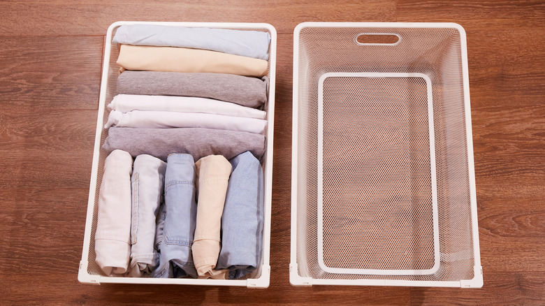 Clothing in clear bins