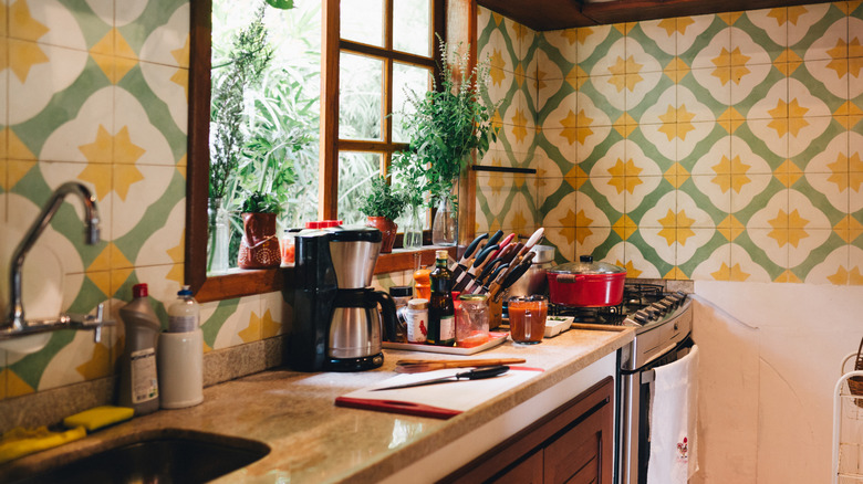 Kitchen with yellow and green tile