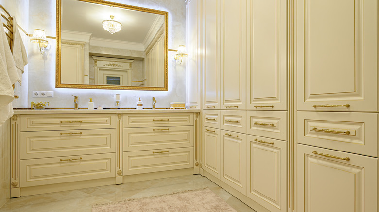 A yellow and gold bathroom