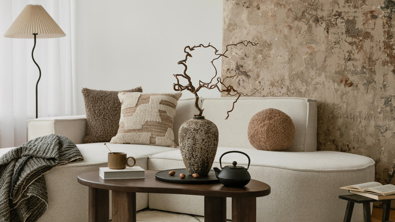 Japandi style living room with textured wall in background