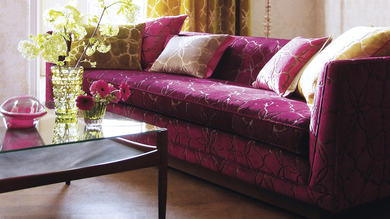 fuschia patterned sofa in small living room