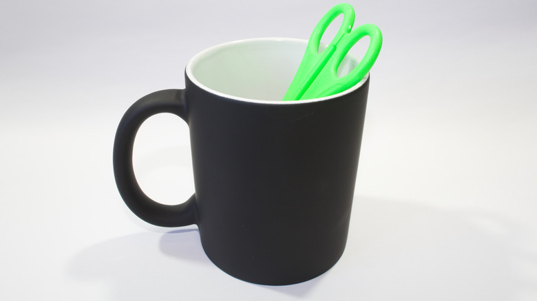 Scissors in a mug