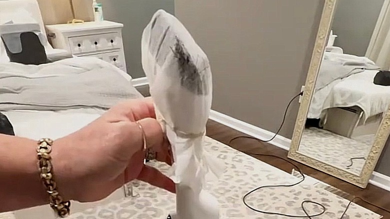 Dryer sheet over end of vacuum