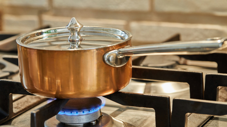 Lid on pot on stove