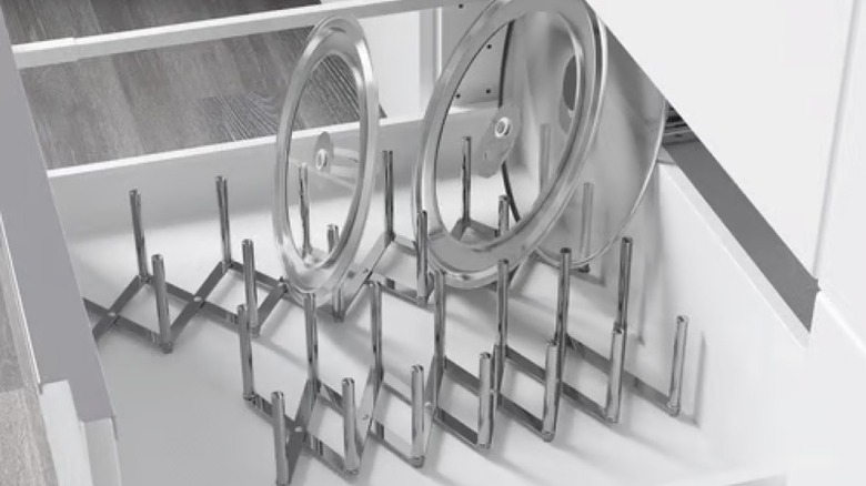 Extendable metal storage for pot and pan lids in bottom kitchen  drawer