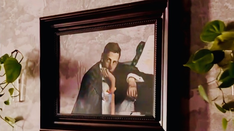 Homeowner backs silhouetted print with wallpaper that matches the wallpaper where the print is hung.