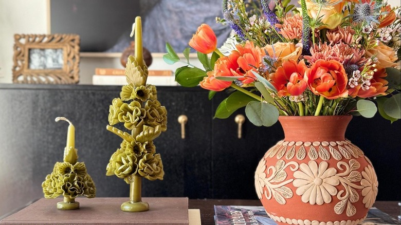 barro-style vase filled with double tulips