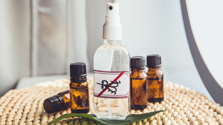 Homemade essential oil bug repellent and herb leaf