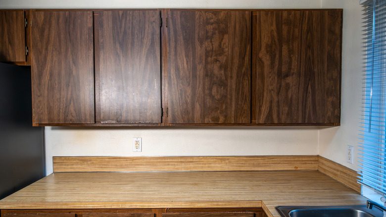 Dark brown stained cabinets