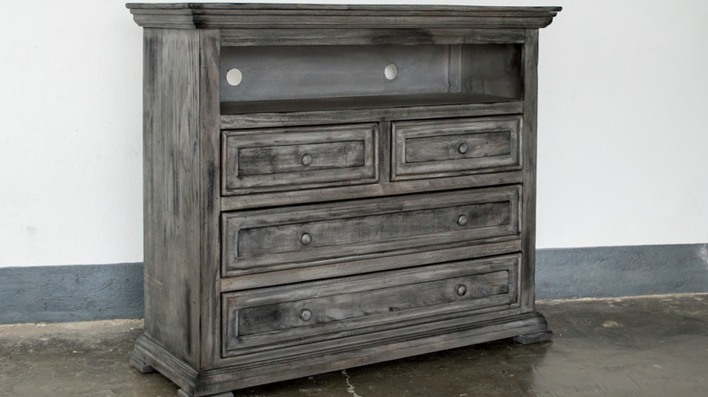 distressed gray wooden dresser