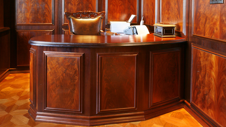 Red mahogany with high gloss desk and wall panels
