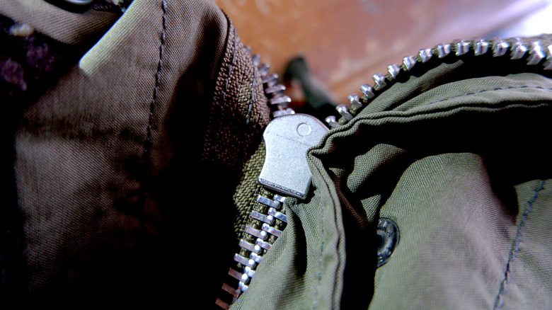 Coat zipper stuck on sale
