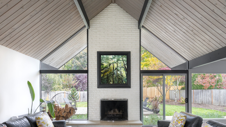 mid century modern home with lots of windows