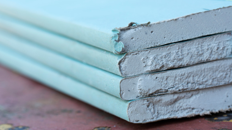 stacked green board drywall