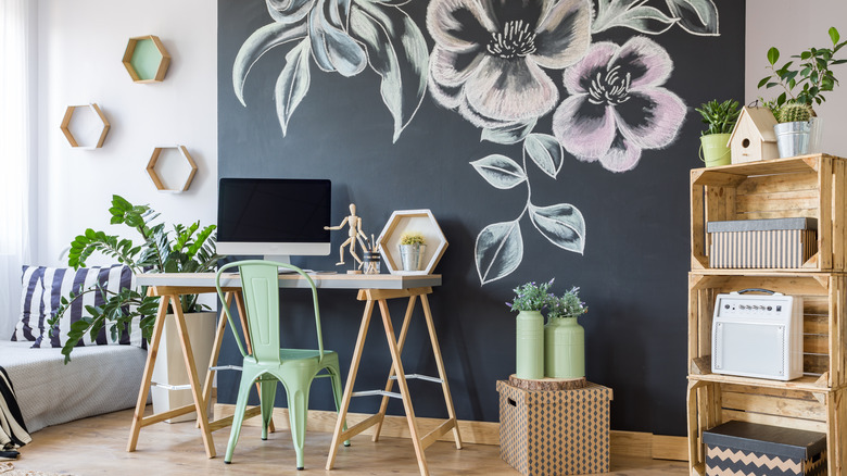 flowers drawn on chalkboard wall