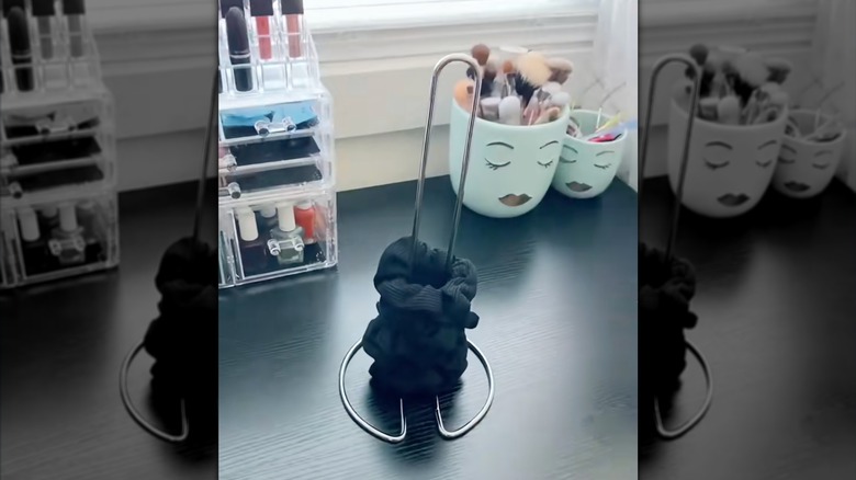 Paper towel holder with scrunchies