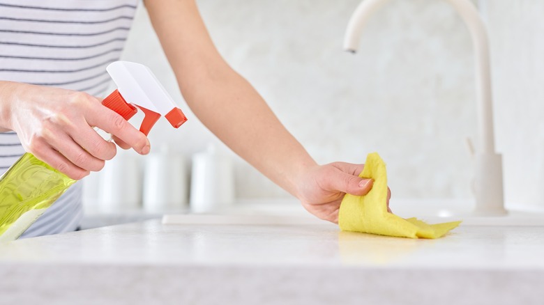 Cleaning counters with lemon spray