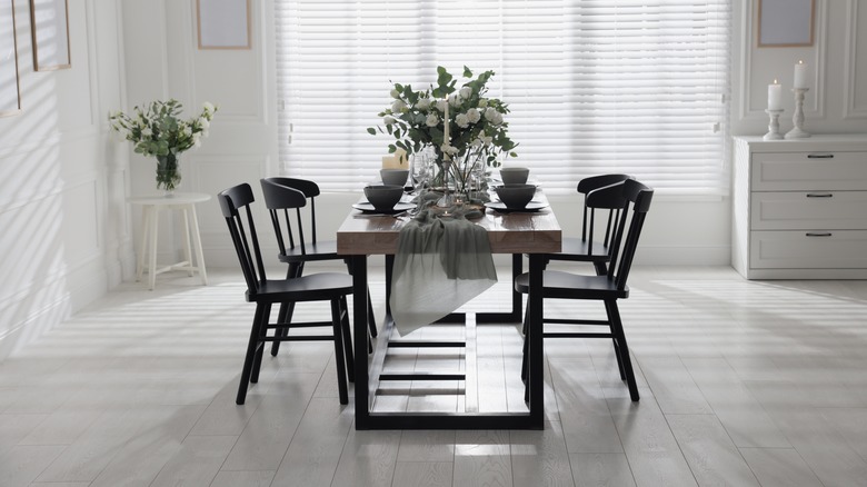 black chairs and wood dining table
