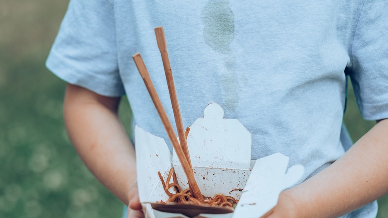 Oil stain on shirt