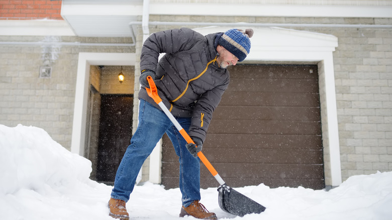 Person shoveling snow
