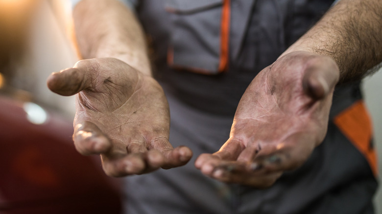 dirty hands of a man