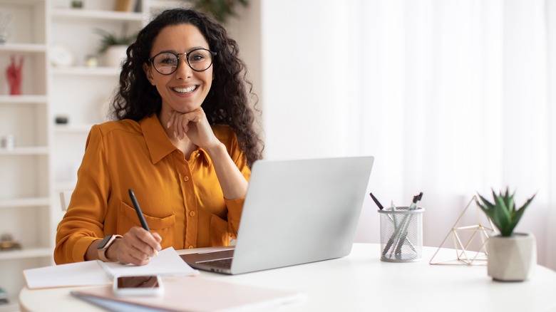 woman in white home office
