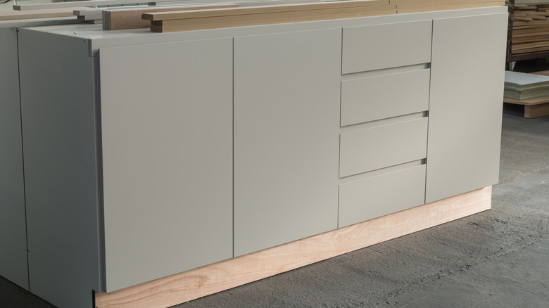 Particle board cabinets
