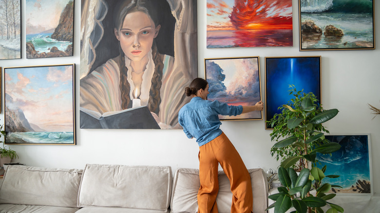 chaotic home gallery of family photos and art