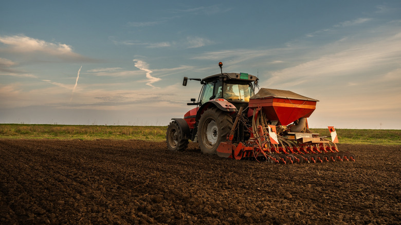 Tractor driving through a field