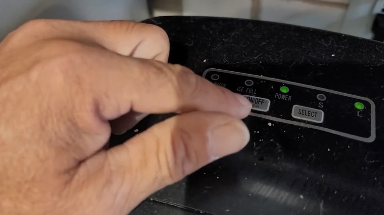 Pressing the ON/OFF button for a self-cleaning cycle
