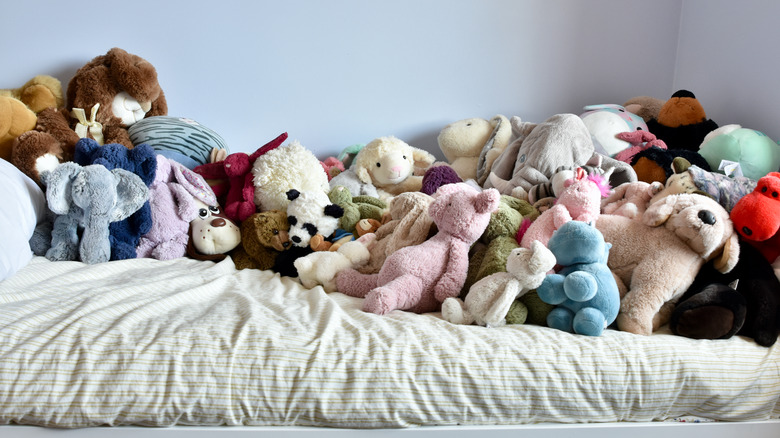 Stuffed animals on bed