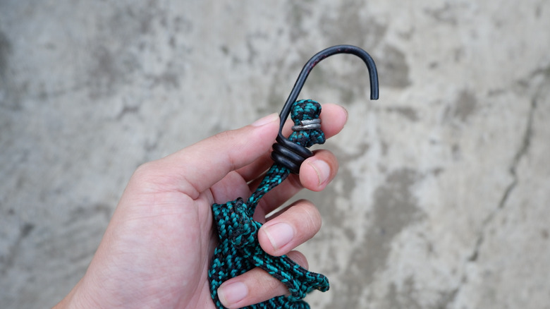 A colorful bungee cord wrapped in a spiral