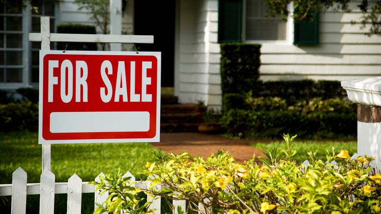 for sale sign in yard