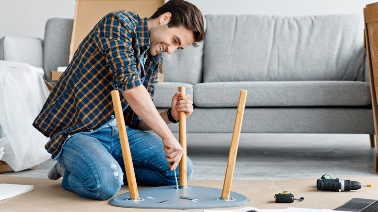 DIYer assembles side table