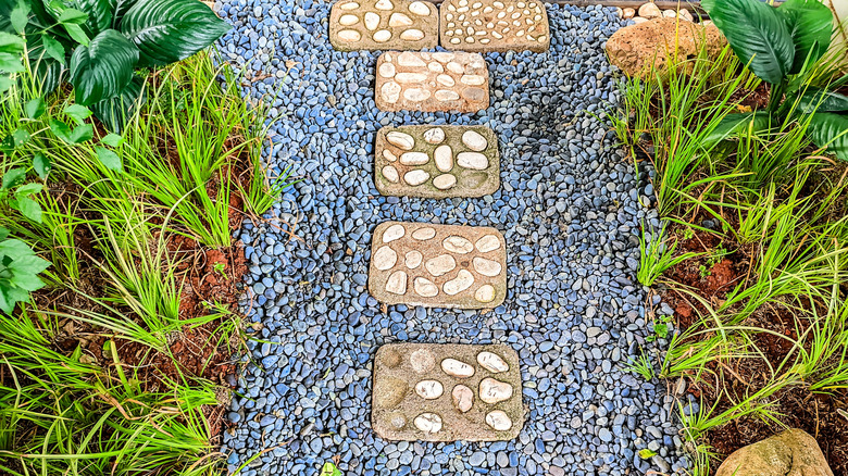 A garden path with organic DIY stepping stones.