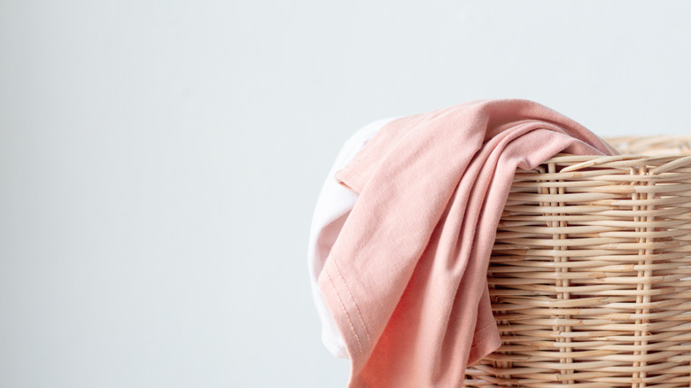 wicker basket with laundry