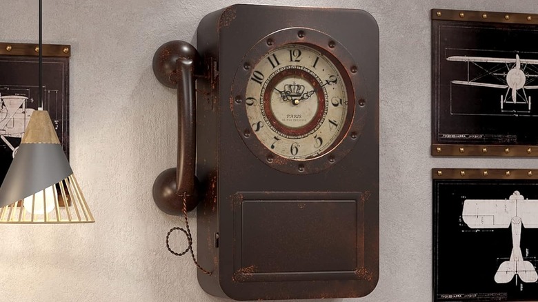 faux vintage telephone storage box on wall