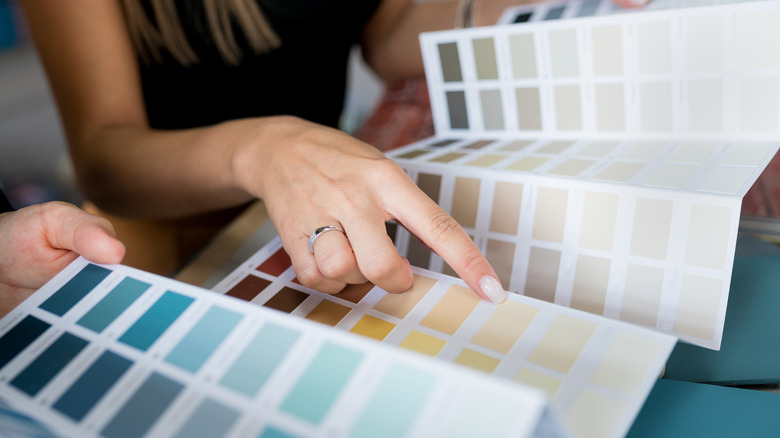 Women choosing paint colors