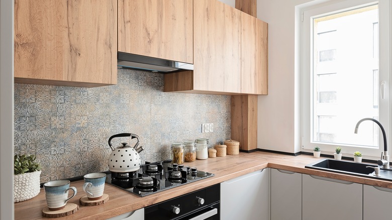 small kitchen with wooden cabinets