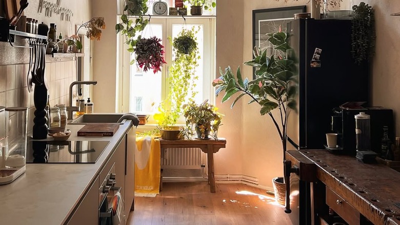 small vintage styled kitchen with workbench on right side