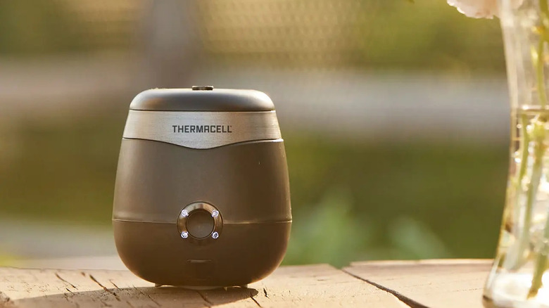 Thermacell E-ZoneGuard Patio Max Mosquito Repeller placed on a wooden table