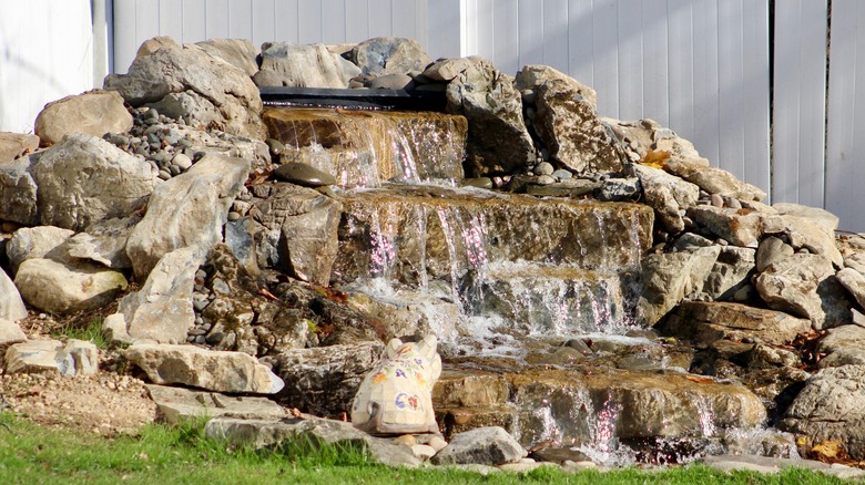 rocky waterfall backyard