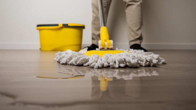 wet floor and mop