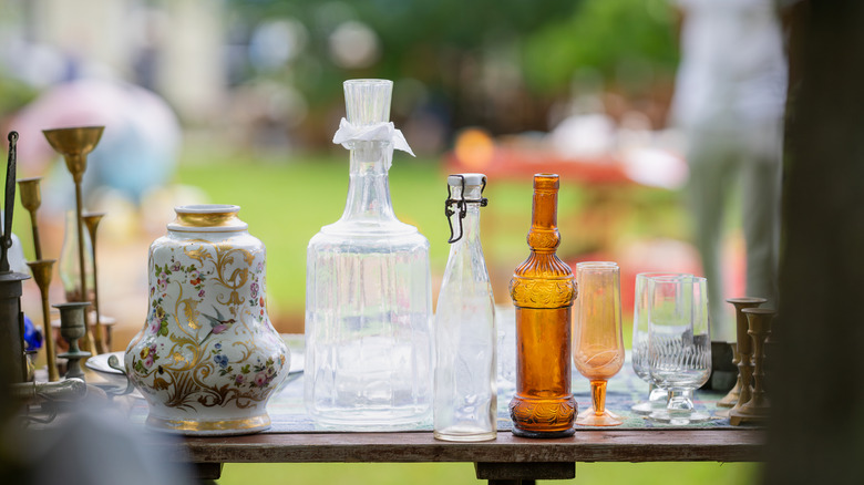 antique vessels, decanters, and candle holders