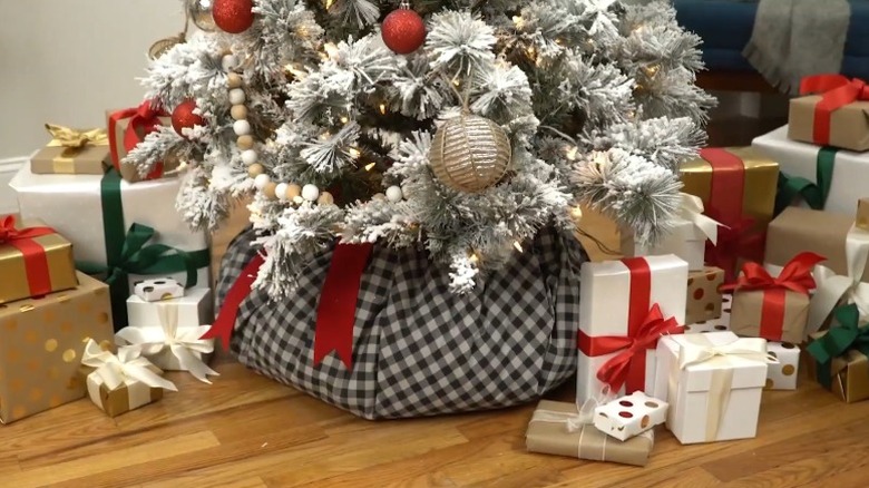 Flocked Christmas tree with fabric-wrapped base