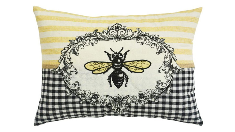 throw pillow with a bee