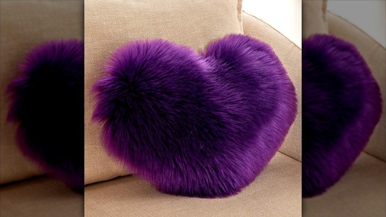 fuzzy purple heart-shaped throw pillow