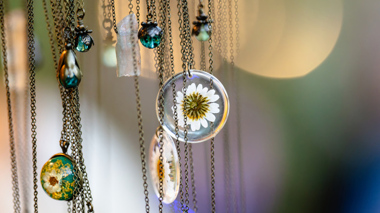 closeup view of a few dainty hanging necklaces