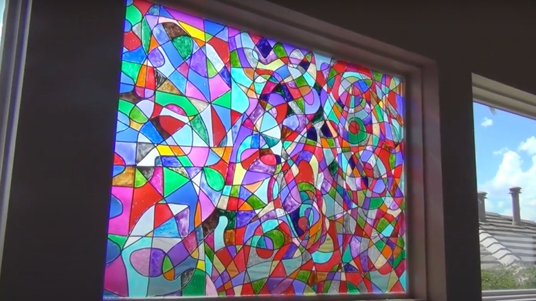Colorful DIY stained glass piece in window